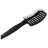 Cepillo Esqueleto Curvo Nomnom para desenredar el cabello de manera suave y eficiente, adaptándose a la forma del cuero cabelludo.